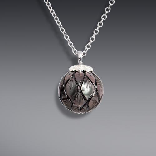 Carved Pearl Pendant